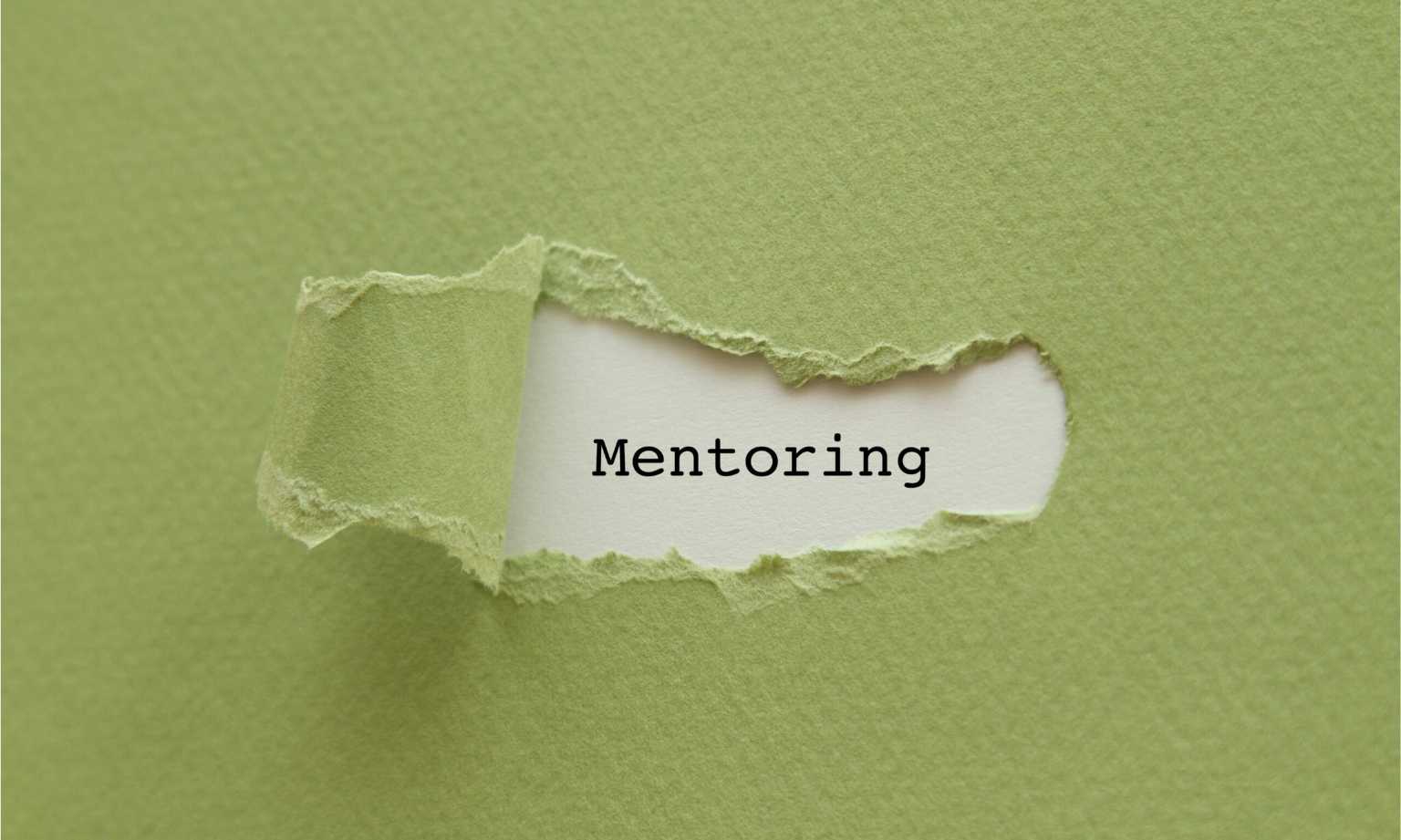 Mentoring text on torn paper